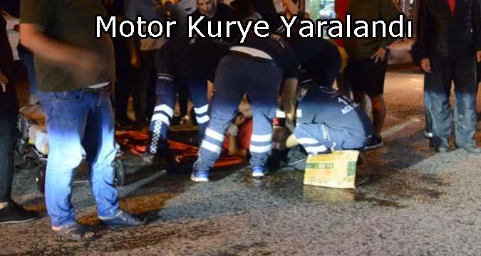  Otomobil ile çarpışan motosikletli kurye yaralandı