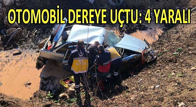 OTOMOBİL DEREYE UÇTU: 4 YARALI